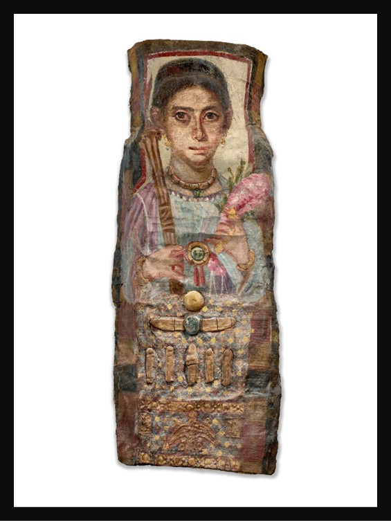 A Roman-period Fayum Mummy portrait of a young woman, painted in encaustic with gilded stucco motifs on linen. She is shown front-facing, with large dark eyes framed by heavy brows, and wears rich gold jewelry including a broad neck torque and rings.