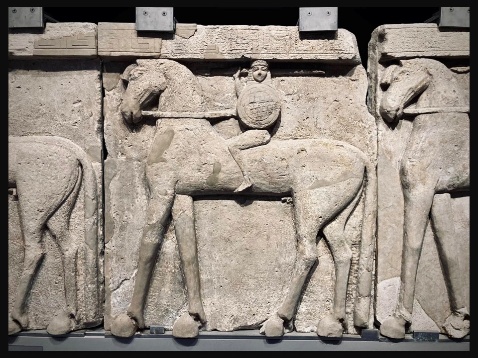 Frieze of Temple A at Prinias, Early Archaic Greek relief (650–600 BC) carved in poros stone, depicting in horsemen Orientalizing style, displayed at the Heraklion Archaeological Museum