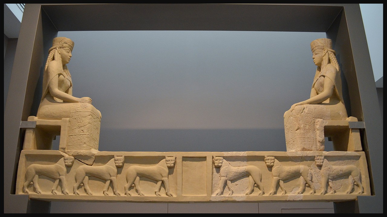 Lintel of Temple A at Prinias, Early Archaic Greek stone relief (650–600 BC) with enthroned goddesses and panther frieze, Heraklion Archaeological Museum.
