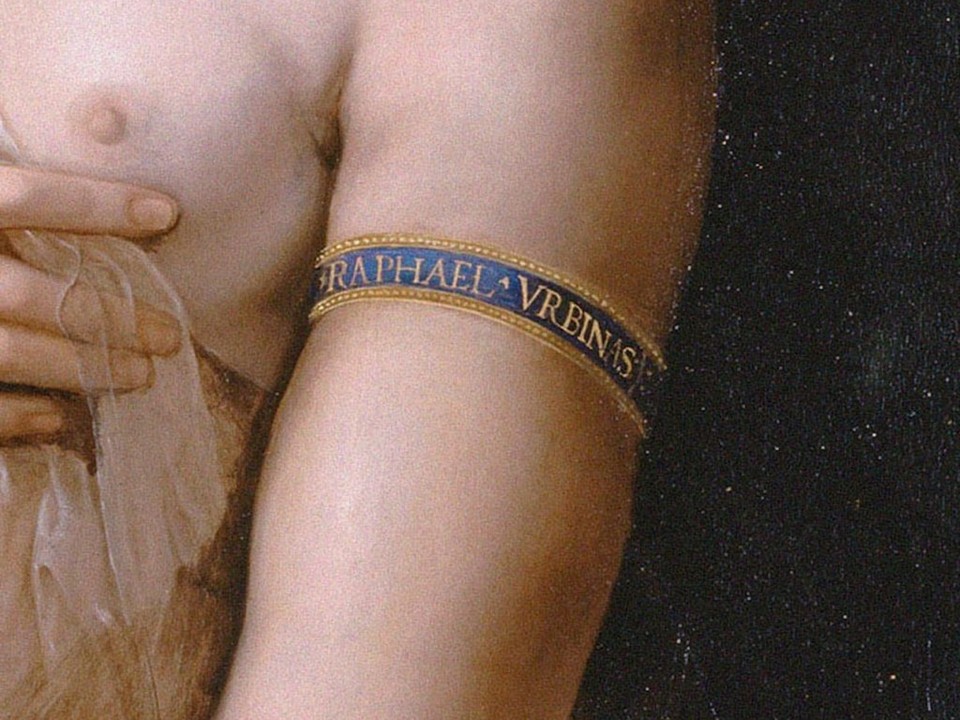 Raphael, La Fornarina, c.1519–20, oil on panel, detail of the bracelet. A close-up of the white ribbon armband tied around the subject's left arm, inscribed with the words "RAPHAEL URBINAS" in elegant lettering, marking the painting as an intimate and personal declaration by the master himself.